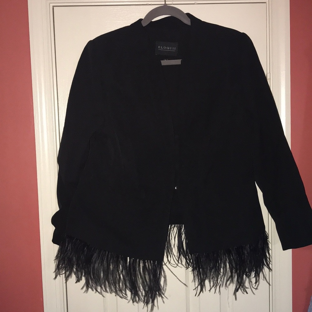 Black blazer with feather bottom very classy